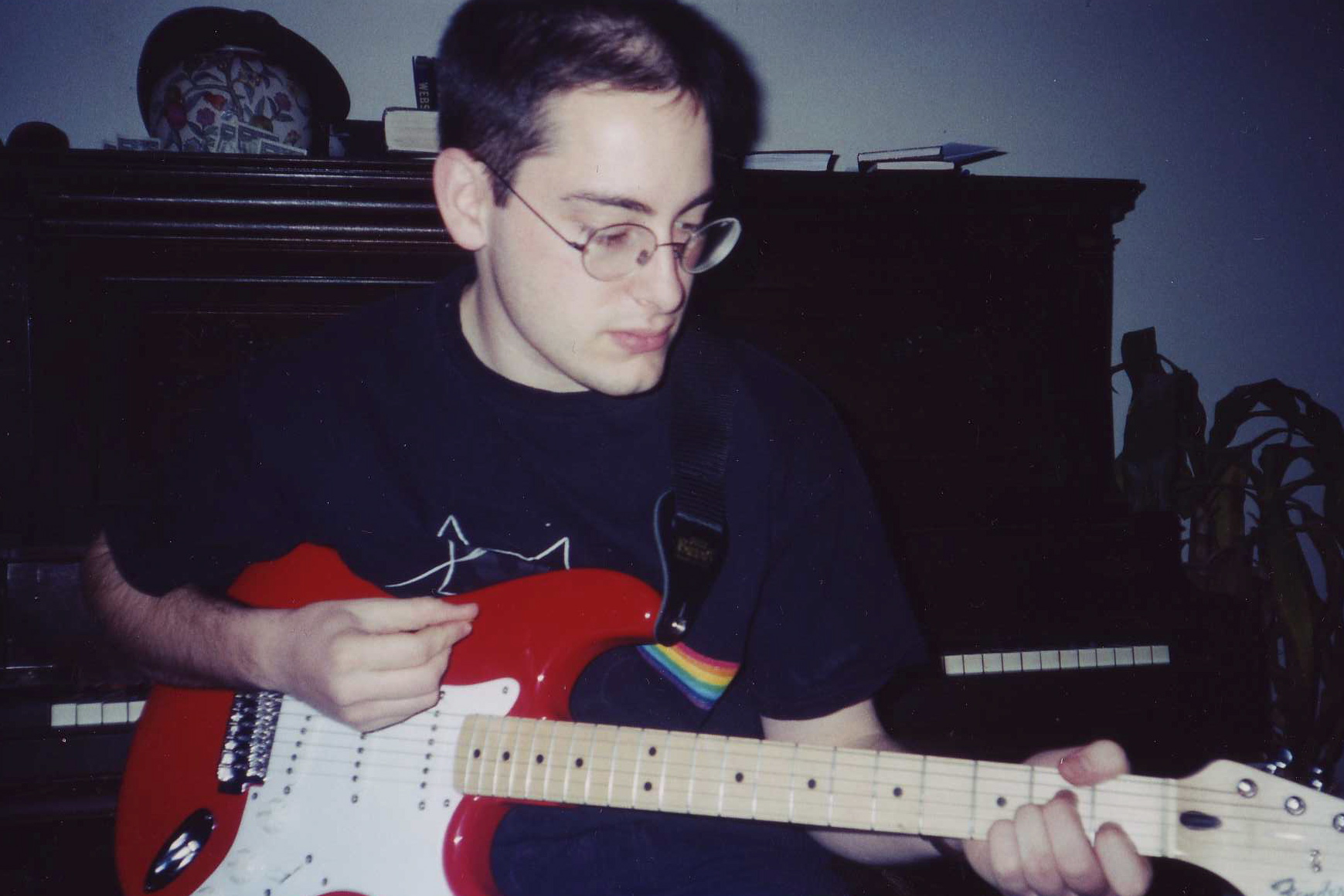 A red Fender Stratocaster, for some reason. Circa 1998.